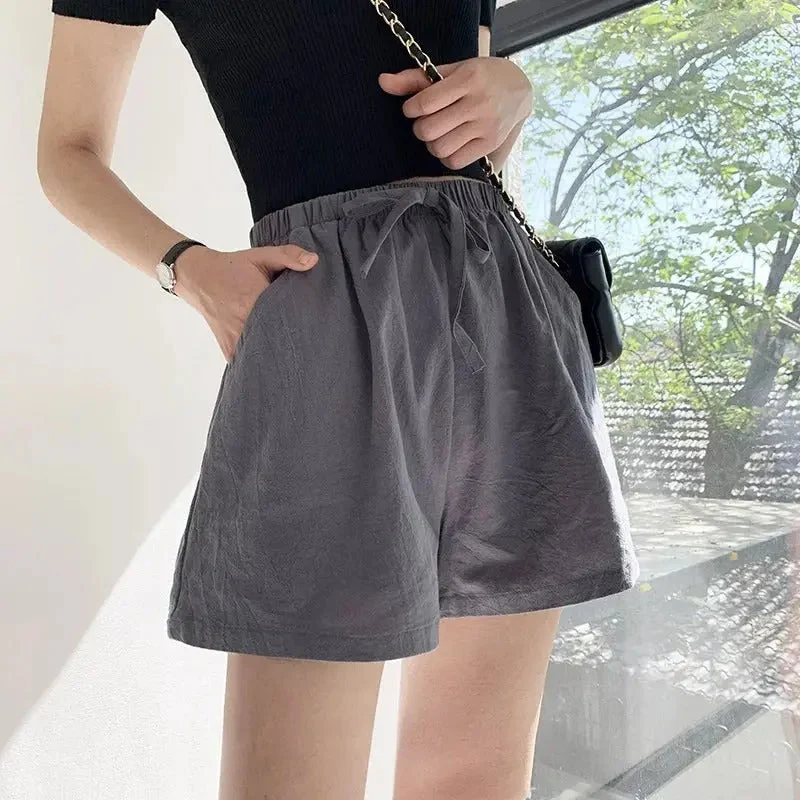 Damshorts med hög midja, dragsko och texturerad yta - Bild 9